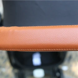Funda cuero PU para manillar cochecito onda cruzada plateada elegante