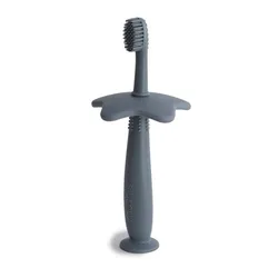 Cepillo de dientes infantil Mushie Flor – Ergonómico para niños