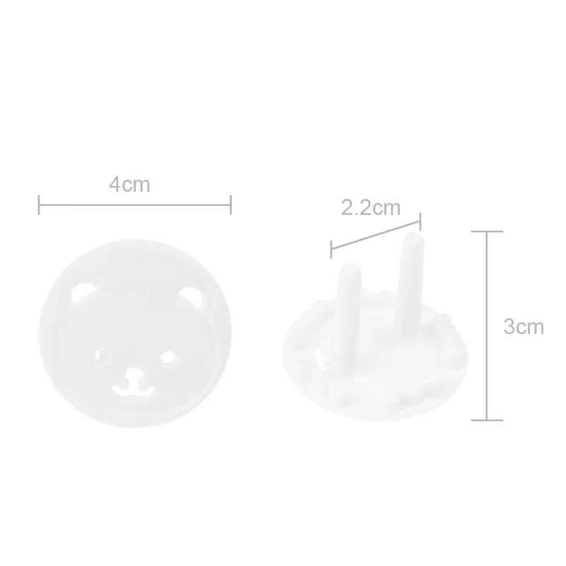 Dos objetos con medidas proporcionadas. A la izquierda hay un objeto circular con una cara de oso, que parece ser un juguete o un elemento decorativo. El diámetro de este objeto está etiquetado como 4 cm.
