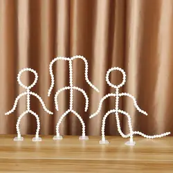 Muñeca articulada de peluche con soporte flexible