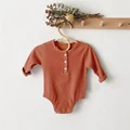 orange bodysuit