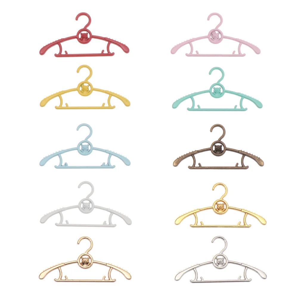 Mini perchas metal ropa muñecas - vista principal