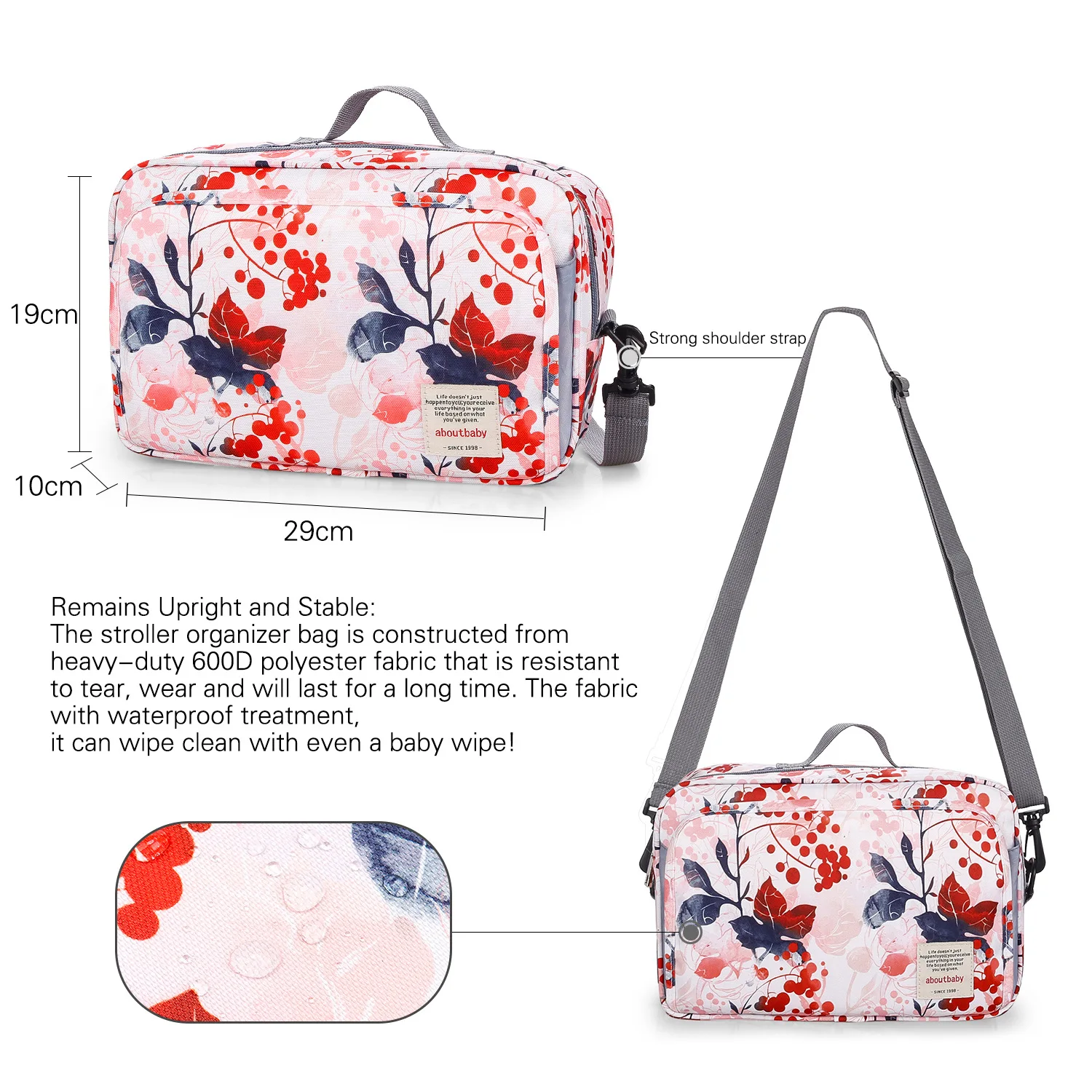 Un bolso organizador para cochecito con estampado floral. Parece estar diseñado para acoplarse al asa de un cochecito para mayor comodidad mientras está fuera de casa con un bebé. El bolso tiene varios compartimentos, incluido uno transparente en la parte inferior, que probablemente esté destinado a artículos como un teléfono o llaves.