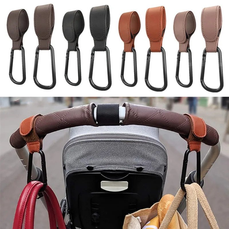 Colgador de Gancho del Cochecito de bebé portátil de cuero PU, gancho de velcro, mosquetón, organizador de carrito, Clip para accesorios de cochecito, 1/2 uds.