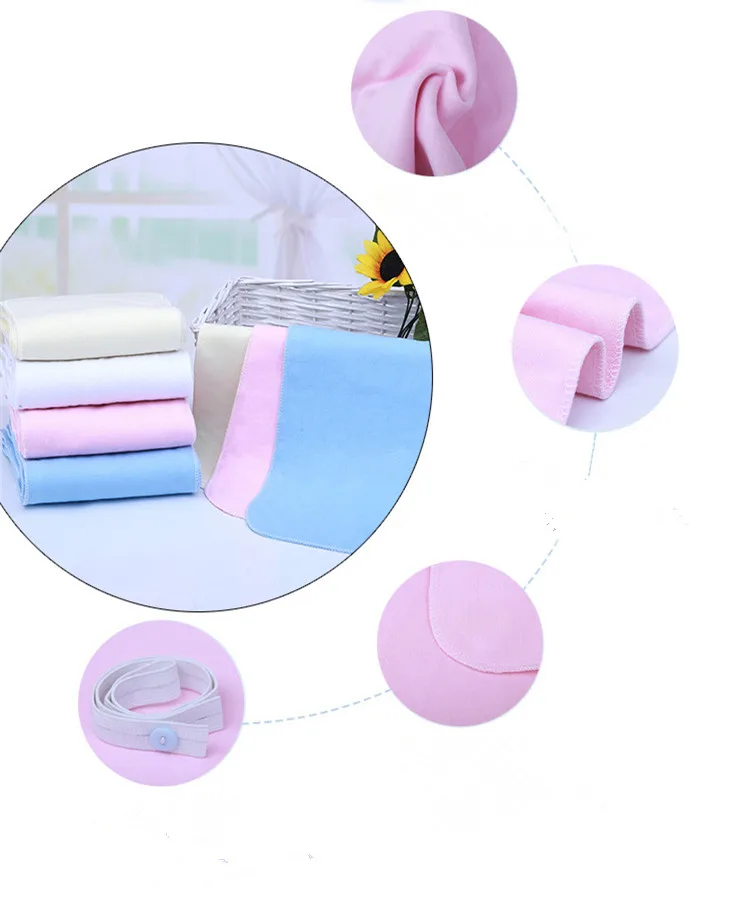 Una colección de artículos relacionados con bebés, probablemente para una guardería o un baby shower. Hay varios elementos representados:

1. Una pila de mantas de bebé dobladas de varios colores, incluidos rosa, azul y blanco.
2