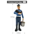 Farmer hold dog