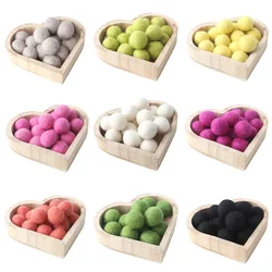Pompones de lana para manualidades y habitación infantil