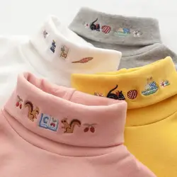 Blusa manga larga con cuello alto bordado para niña de algodón