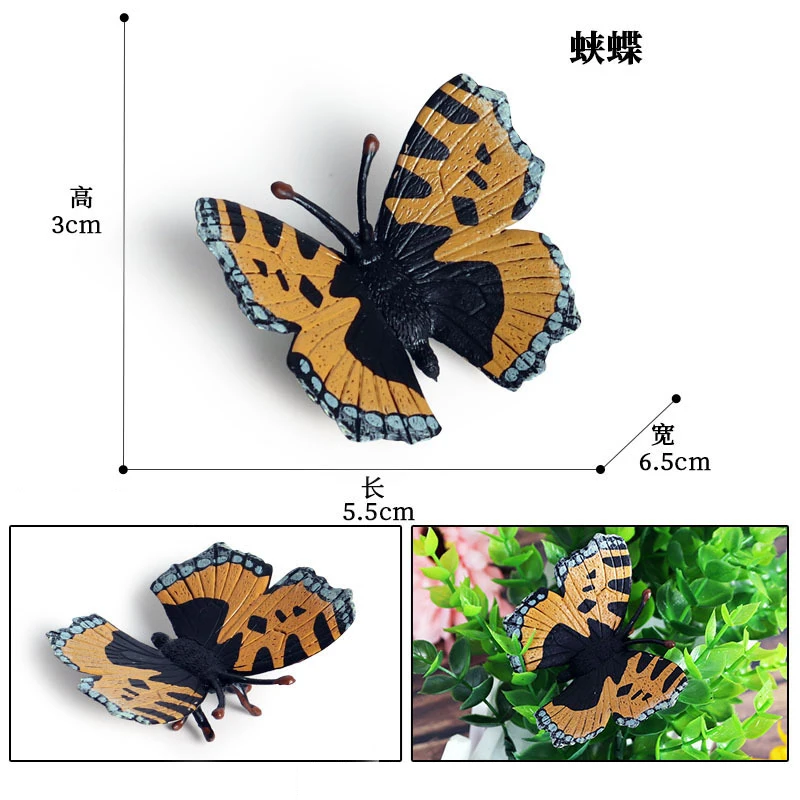 Una mariposa decorativa con un estampado de colores negro, amarillo y azul. Parece ser una joya o un elemento decorativo, posiblemente un broche o un colgante.