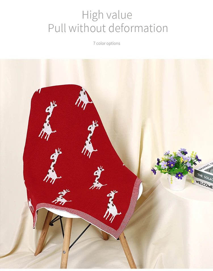 Manta de bebé con diseño de cuadros y jirafa