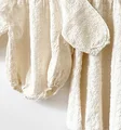 beige bodysuit