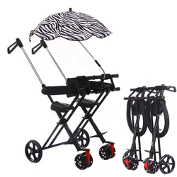 Triciclo doble plegable para gemelos con barra regulable y ruedas