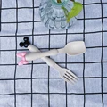 beige spoon fork