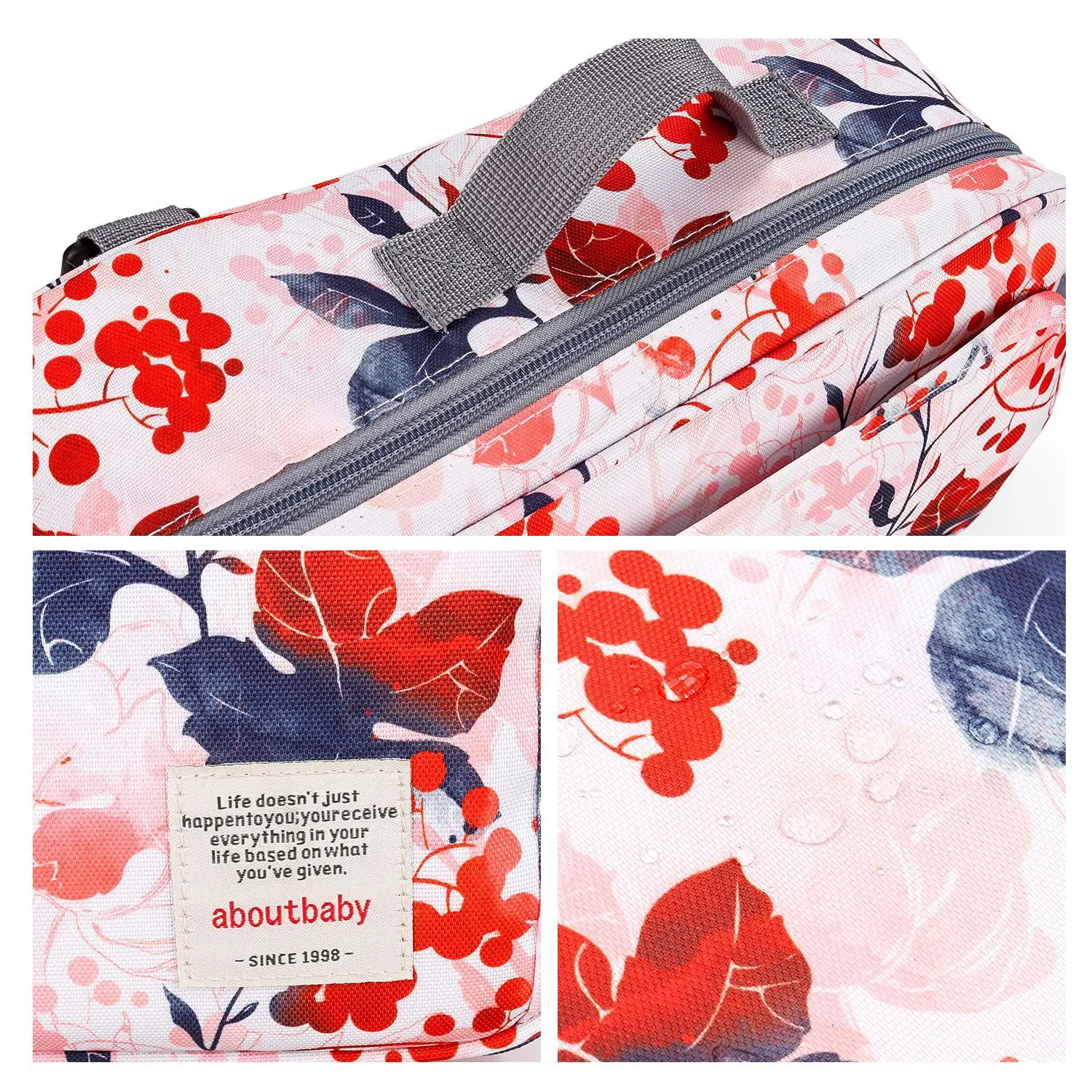 Una maleta con un estampado floral de flores rojas y rosas sobre un fondo blanco. El equipaje tiene un asa gris y una cremallera gris que recorre la parte superior.