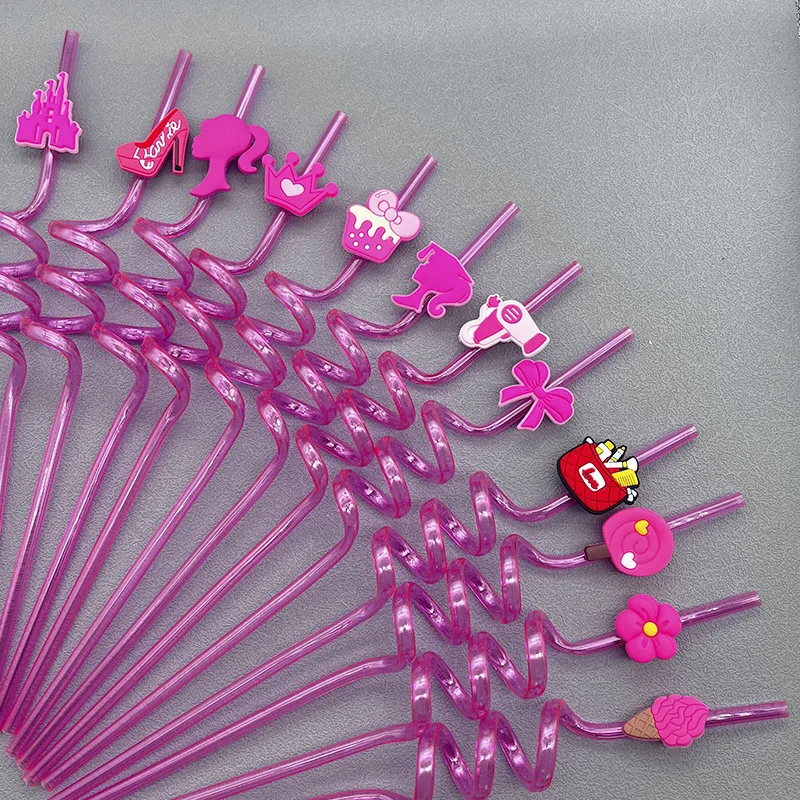 Un ventilador rosa con clips de cabello rosa y morado