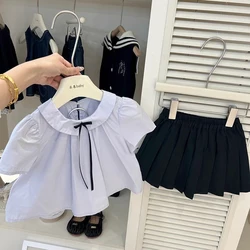 Conjunto falda plisada con camisa manga corta para niña – Verano