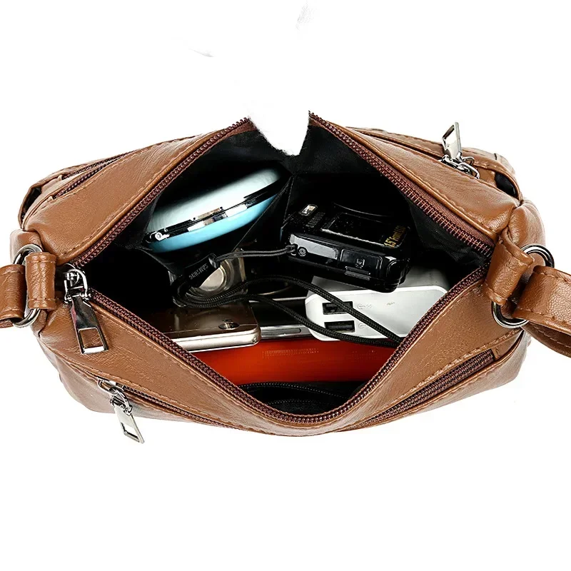 Bolso bandolera maternal de cuero suave con compartimentos - imagen 4