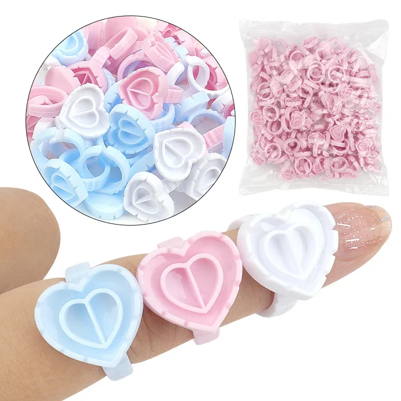 Taza de anillo de pegamento en forma de corazón, 100 Uds., extensión de pestañas de plástico desechable, soporte para pigmento de tatuaje, paleta, suministros de maquillaje para pestañas, herramientas