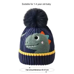Gorro Pointette de lana con dinosaurio para niño