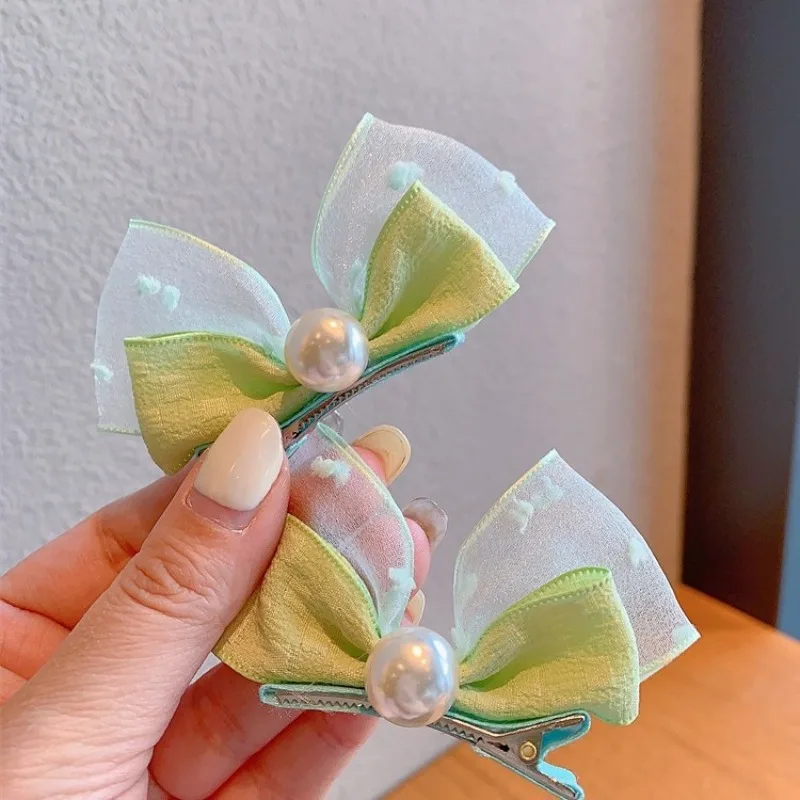 Pinzas con lazo de perlas y orejas de conejo para niñas - imagen 3