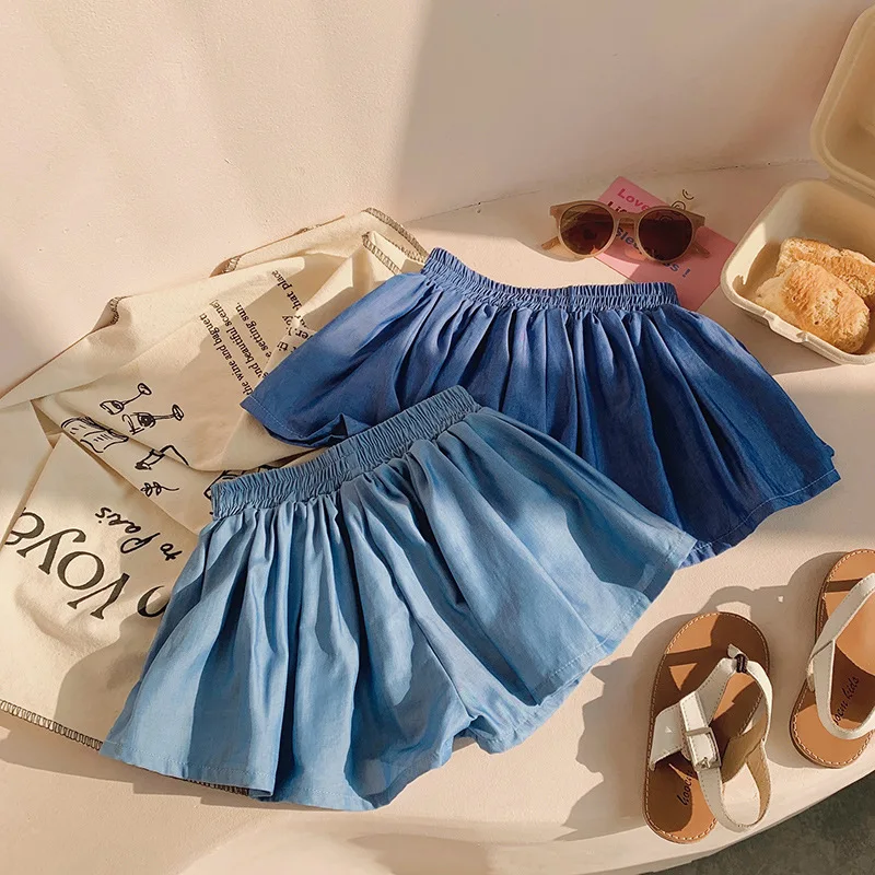 Pantalones cortos para niñas, faldas informales de verano, pantalones cortos plisados con cintura elástica para niños, ropa de Color sólido, pantalones Kawaii para niños