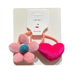 Lazos de tela con flores y corazones para el cabello de niña