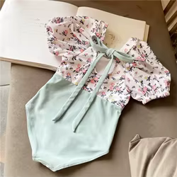 Bañador una pieza floral con lazo para niña