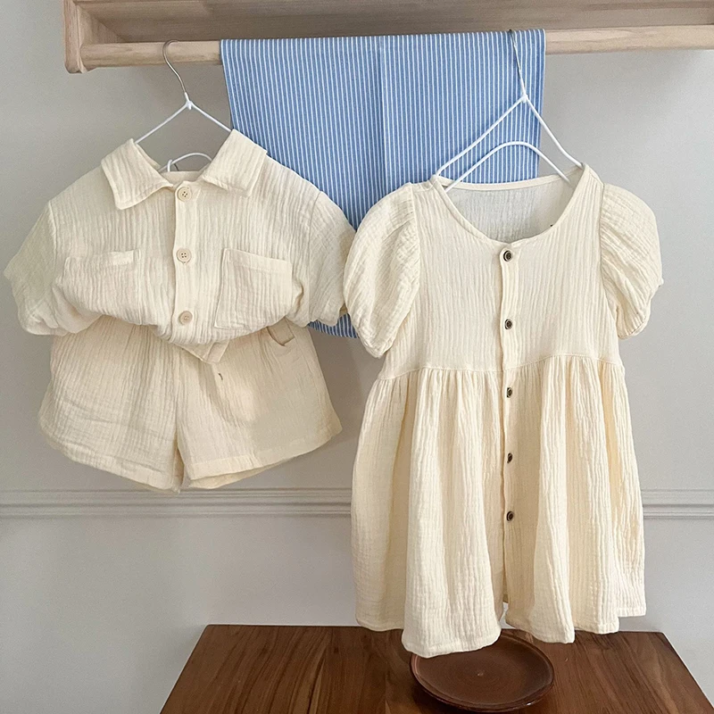 Conjunto de ropa de verano para niños, camisa de manga corta, pantalones cortos, traje informal de 2 uds., vestido de Color sólido para niñas, traje para hermana y hermano - imagen 3