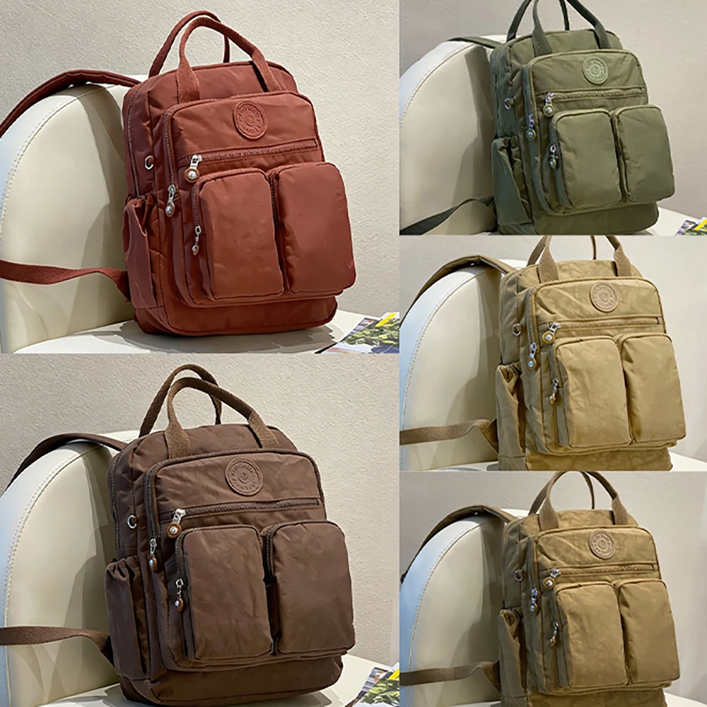 Bolsa de pañales impermeable con bolsillos y porta biberones - imagen 3