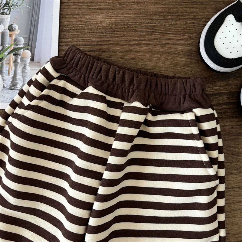 Conjunto acolchado infantil con jersey de lana a rayas - imagen 5