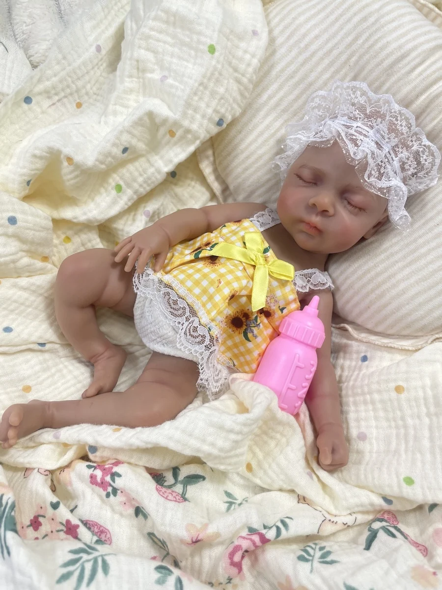 Muñeca Reborn Luna de silicona piel oscura cuerpo flexible lavable