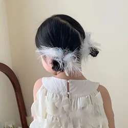 Pinzas para el pelo con plumas de mariposa bohemias infantiles