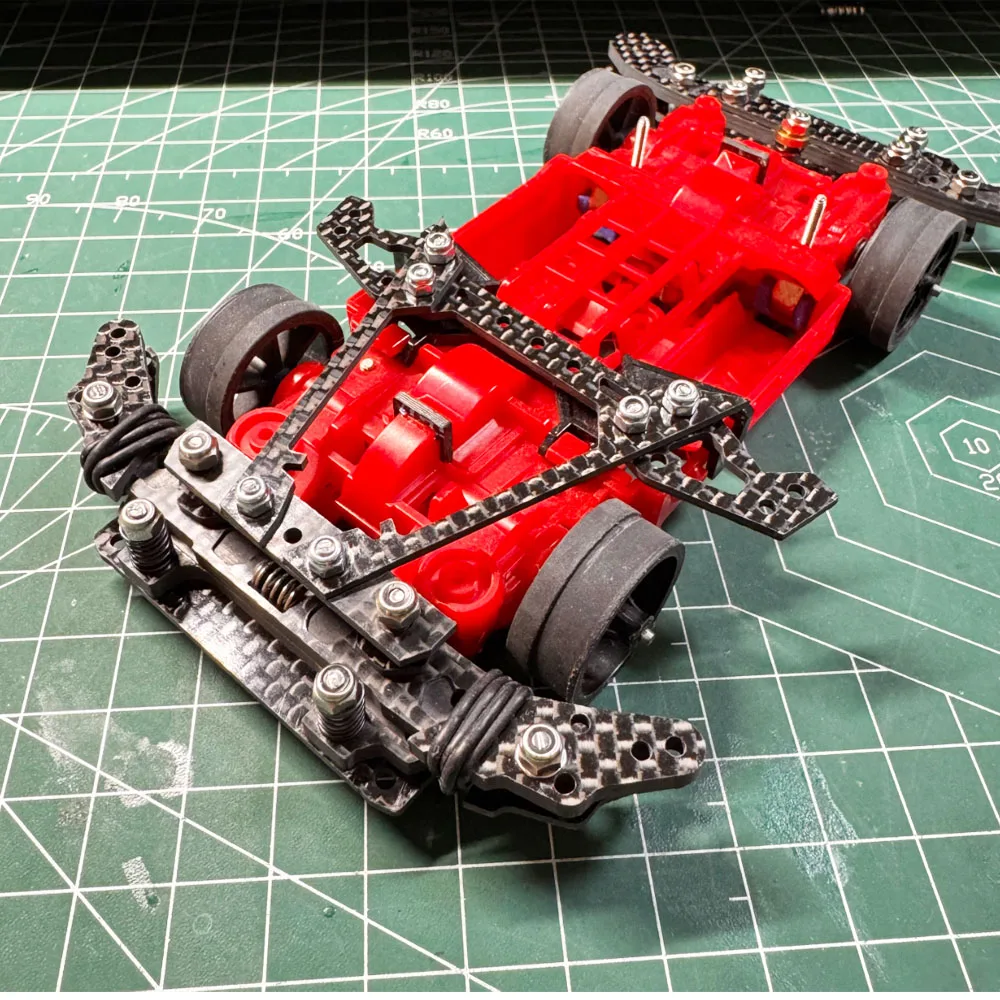 Coche teledirigido 4x4 mini con suspensión de carbono para niños