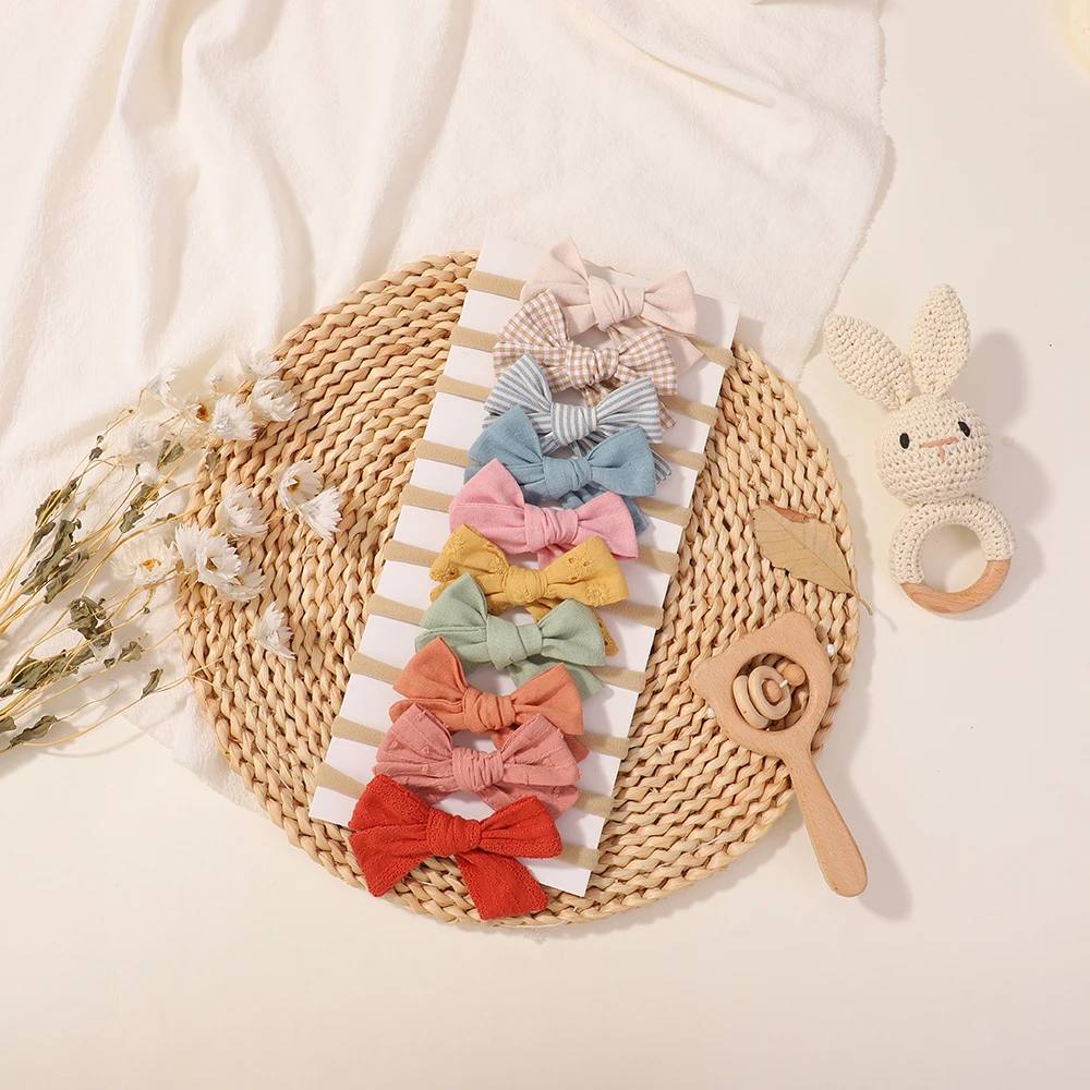 10 Uds. Conjunto de diadema con lazo para niñas, nailon elástico suave, bandas para el pelo de Color sólido para recién nacidos, accesorios para sombreros hechos a mano