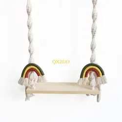Columpio de madera para recién nacidos con macramé fotográfico