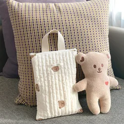 Bolsa de pañales acolchada con oso de peluche