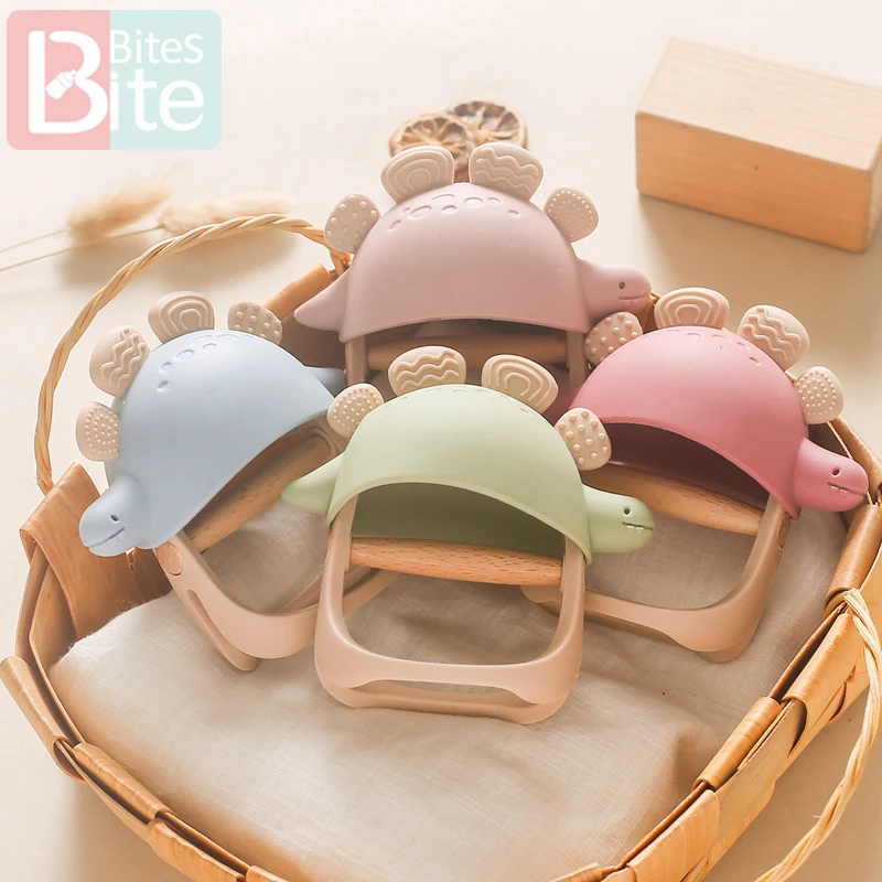 Mordedor de silicona para bebé, guantes de silicona de dinosaurio, utensilios para el cuidado del bebé de 0 a 12 meses, sonajero de silicona para el cuidado Dental, juguetes, goma de mascar para bebé
