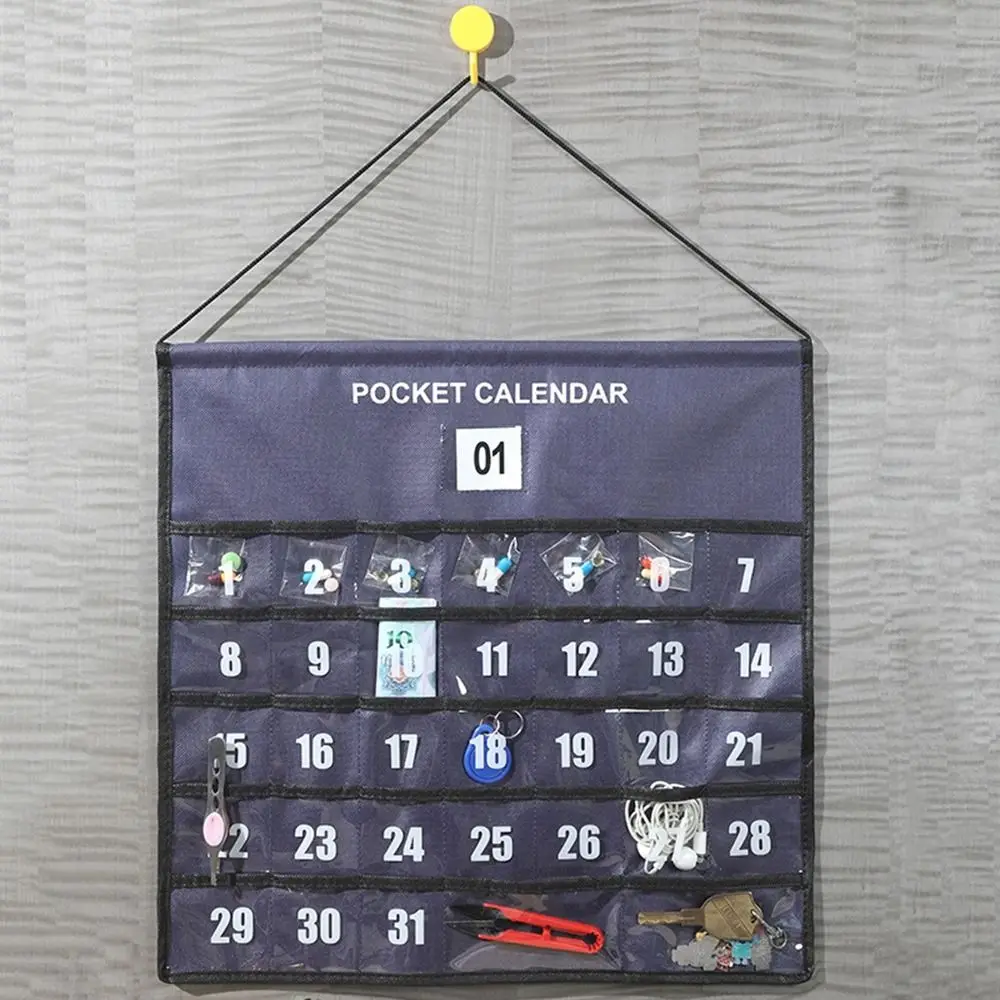Calendario de pared con bolsillos, bolsa de almacenamiento de tela, organizador mensual novedoso para sala de estar y dormitorio