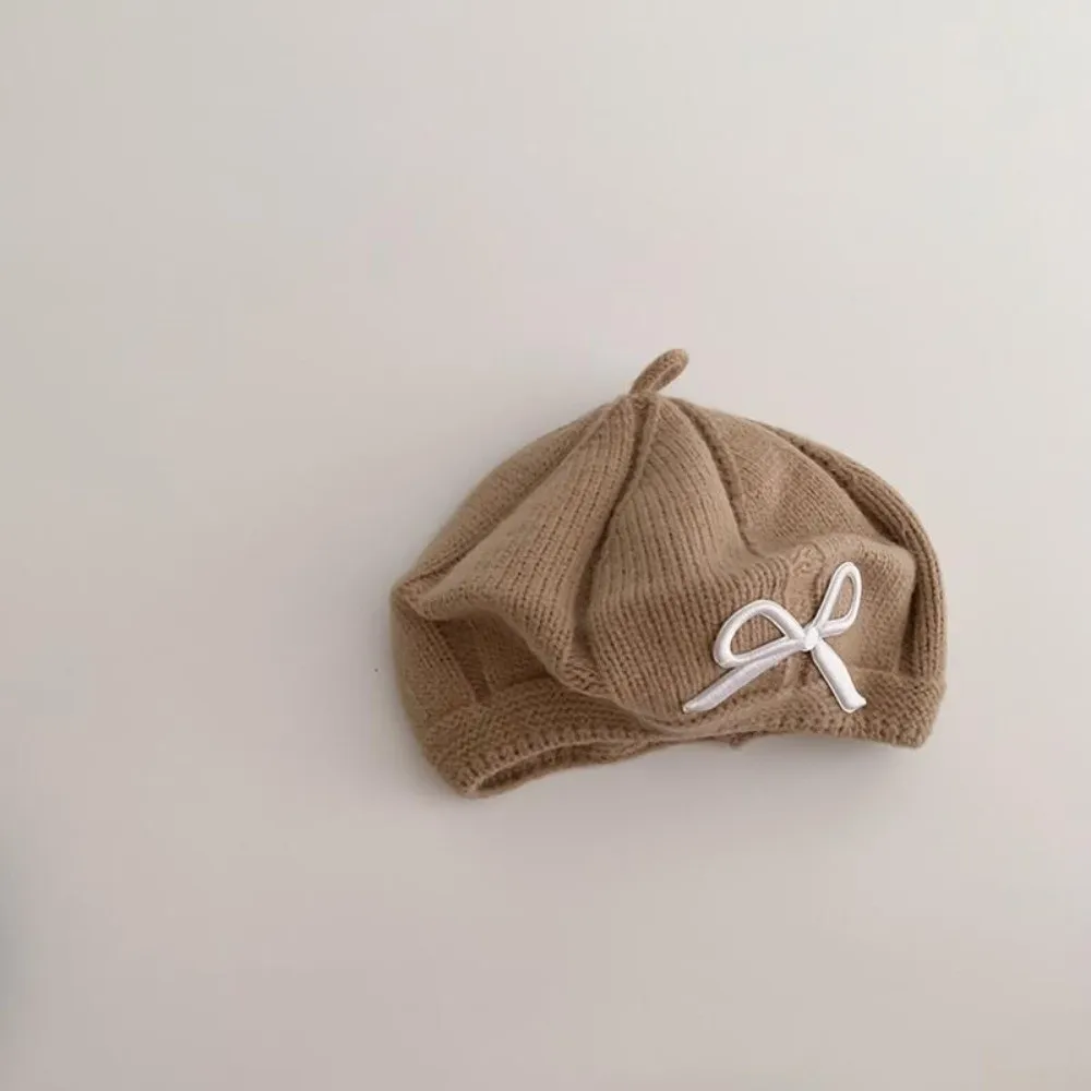 Nuevo Gorros bonitos de punto con lazo, gorros cómodos a prueba de viento, gorro de boina cálido para niños pequeños - imagen 4