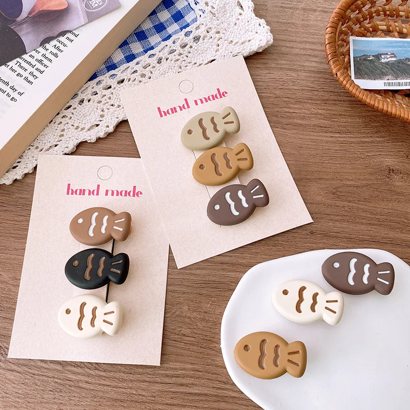 Pinzas pelo niños forma pez taiyaki – Diseño coreano beige con dibujos animados - imagen 5