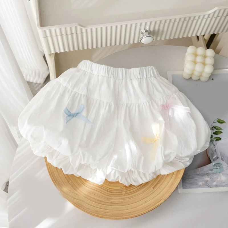Ropa de verano de Color sólido para niñas, pantalones cortos decorativos con lazo, versión coreana, ropa informal doblada para niños, falda de 3 a 7 años - imagen 2