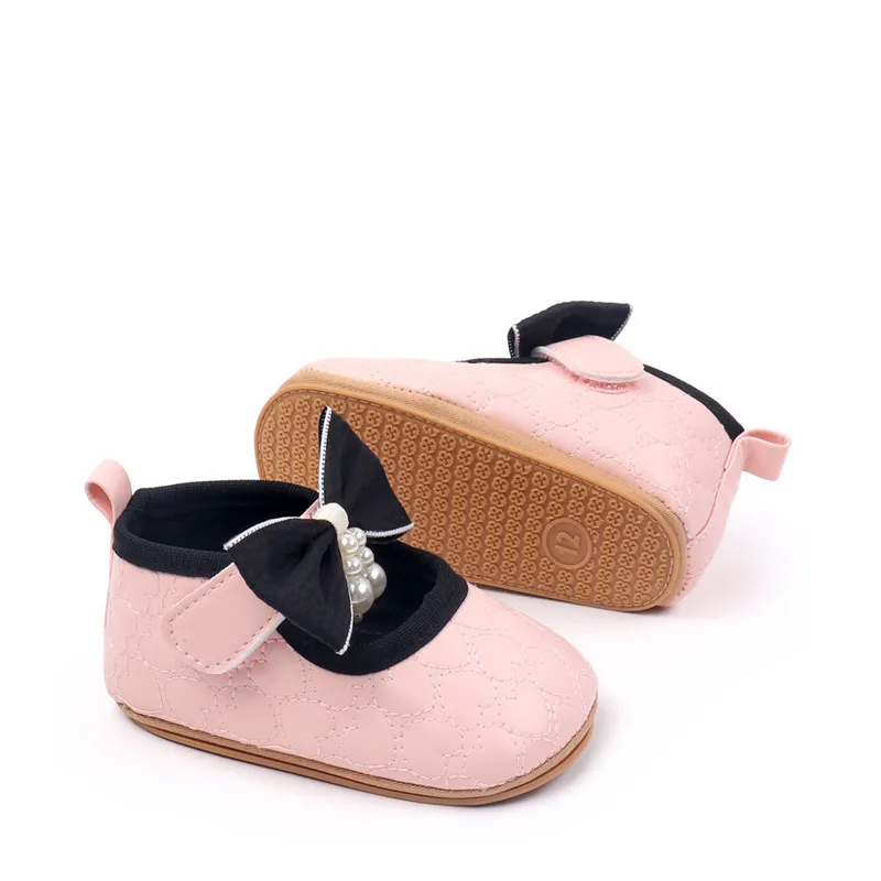 Zapatos de cuna en color rosa