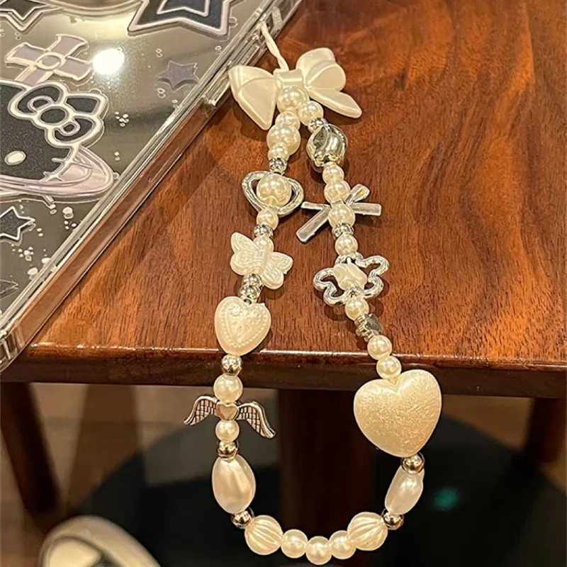 Cadena de teléfono con cuentas de flores y lazo blanco, cordón de lujo, colgante de joyería Universal para IPhone, accesorios para Samsung - imagen 4