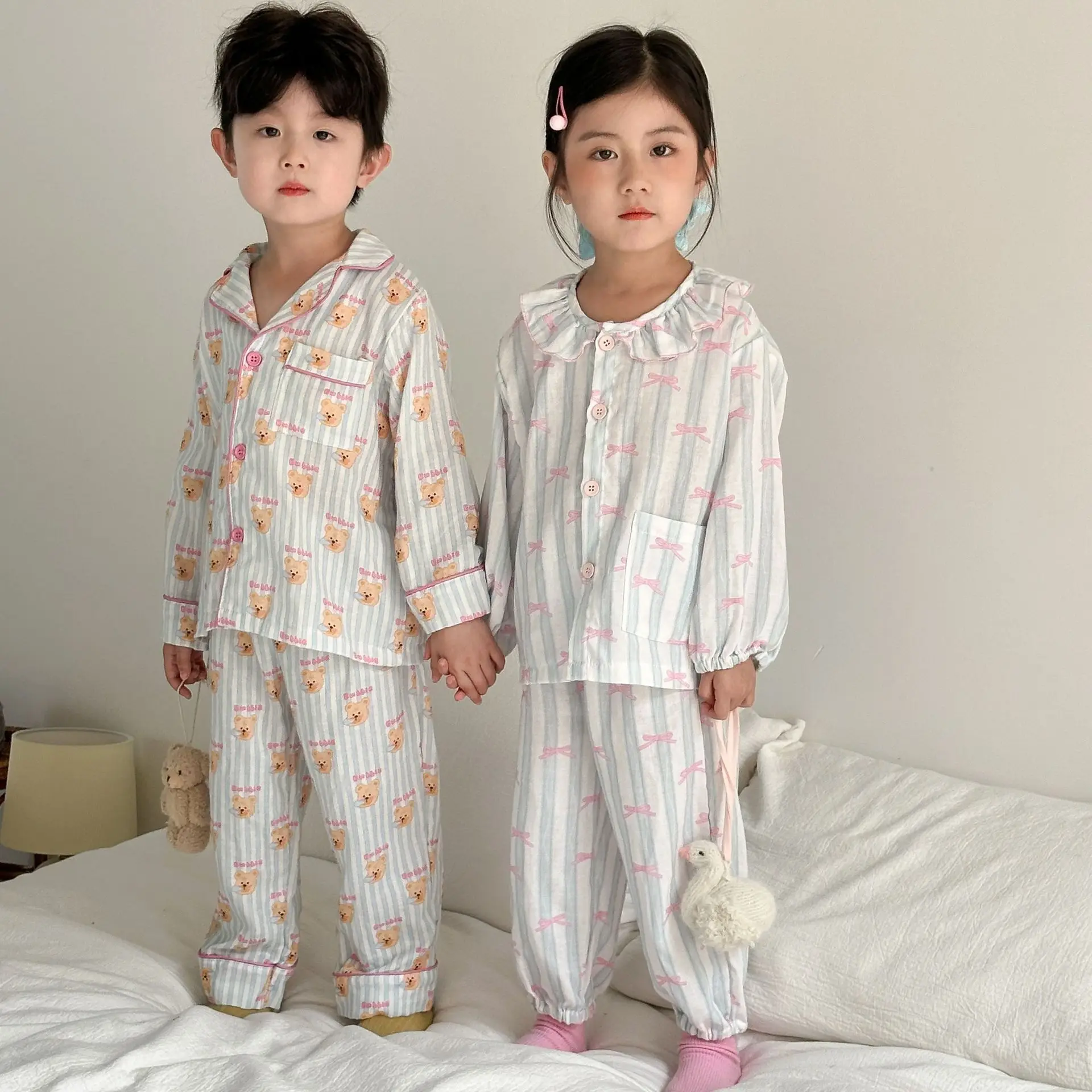 Otoño nuevo conjunto de pijamas para niños lindo oso estampado de lazo Vintage a rayas 1 a 10 años niños niñas ropa de descanso de hilo de algodón