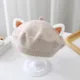 Beige cat ear