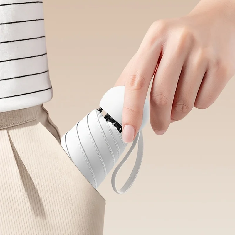 Mini paraguas de viaje de 5 pliegues: paraguas cápsula compacto ultraligero de 6 cunas, cubierta manual portátil para sol y lluvia - imagen 2