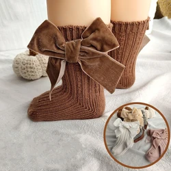 Calcetines invierno de punto grueso con lazos para bebé y niña