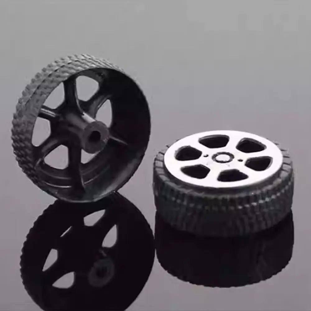 Alta calidad, 30 agujeros, 2mm, accesorios de juguete de cuatro ruedas, piezas de juguetes DIY, rueda de plástico, Mini modelo de ruedas de goma negras - imagen 4