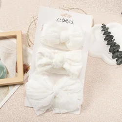 Diadema bebé blanca con lazo elástica de nailon para niña elegante