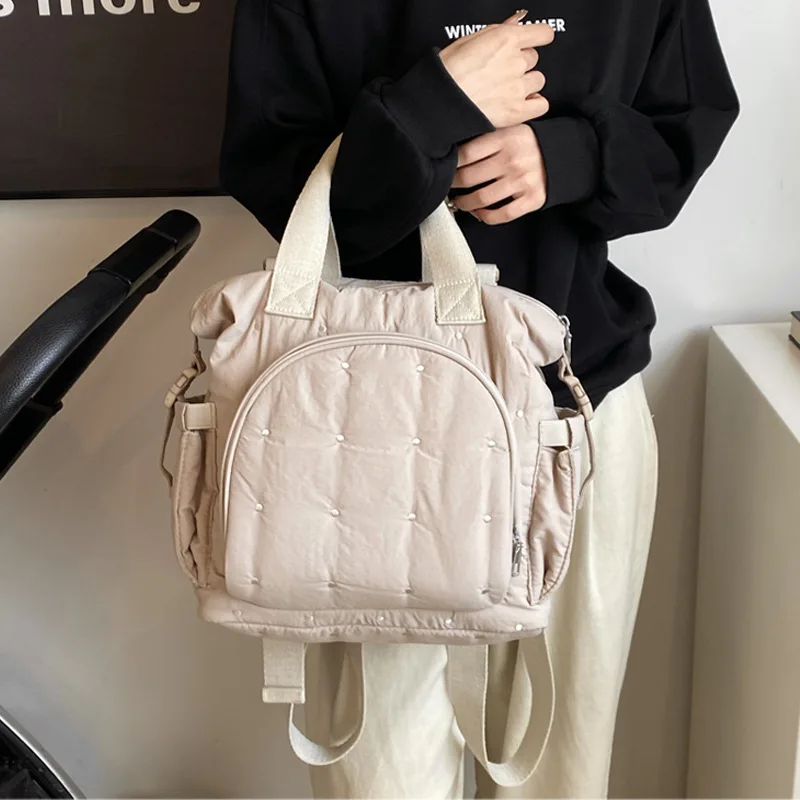 Bolsa de pañales multifuncional para recién nacidos, mochila sencilla de moda coreana, bolso para cochecito de Color sólido de gran capacidad